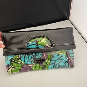 Nine & Co. Black and Green Clutch with Tropical Flair